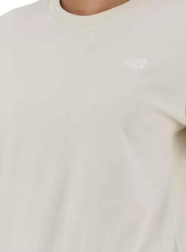 Camiseta New Balance Sport beige para mujer