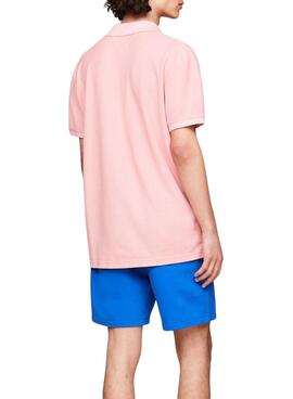 Polo Tommy Jeans Reg Badge rosa para hombre 