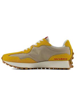 Zapatillas New Balance 327 amarillas para hombre.