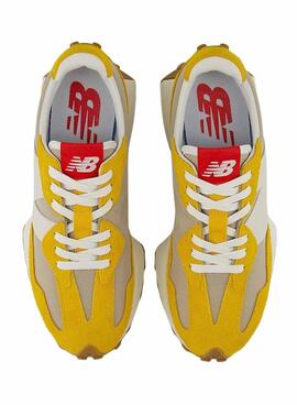 Zapatillas New Balance 327 amarillas para hombre.