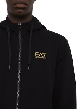Chaqueta Emporio Armani EA7 negro y dorado con capucha para hombre