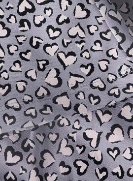 Pantalón flare Name It estampado de corazones lila para niña