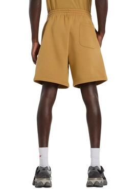 Bermudas New Balance amarillo mostaza para hombre